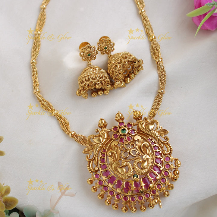 Stunning Peacock floral design pendent with chain with ruby and gold beads