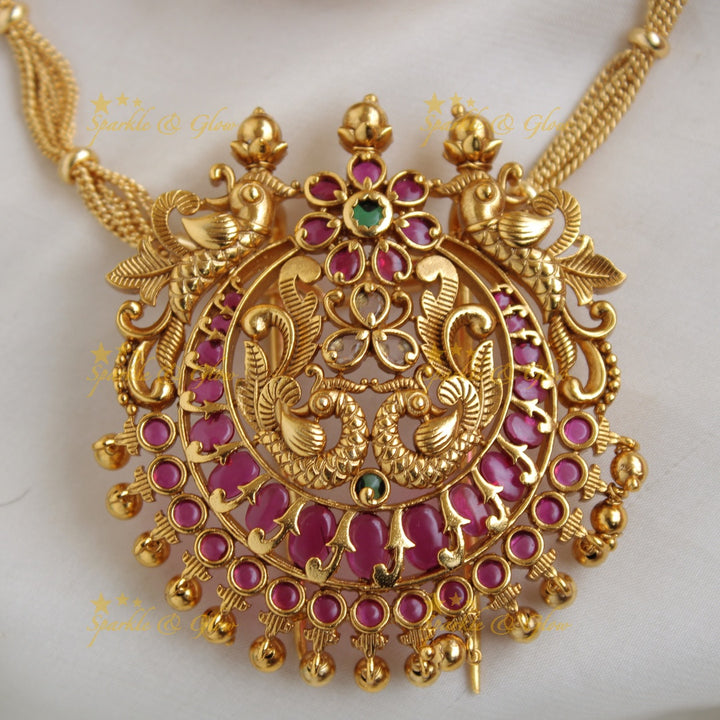 Stunning Peacock floral design pendent with chain with ruby and gold beads