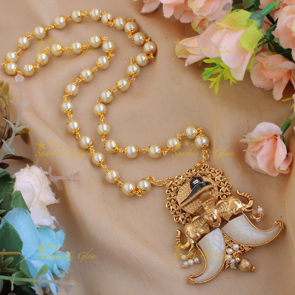 Beautiful Siva elephant carved double Puliguru pendent with red beads chain - red - Sparkle and Glow - White - Back Thread