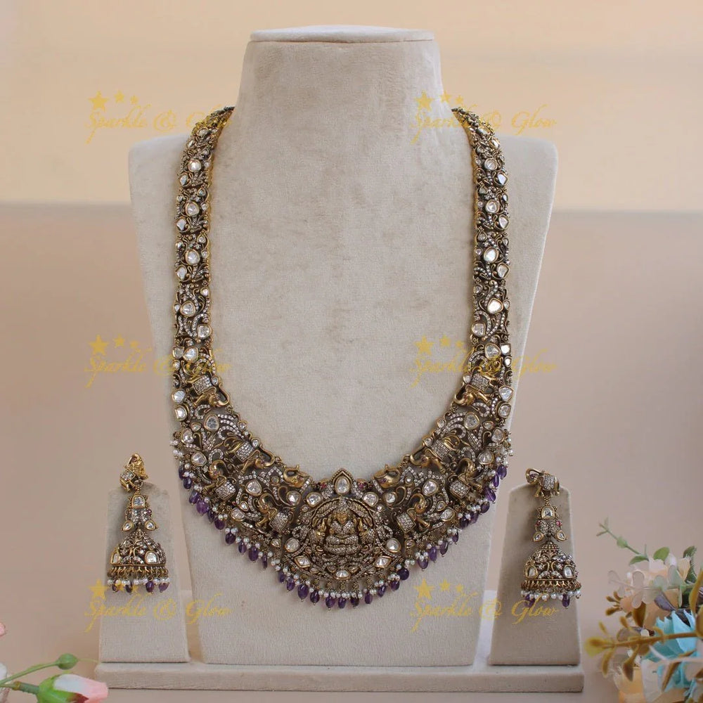 Grand intricate Lakshmi Elephant Peacock design Victorian AD long necklace with purple beads - Sparkle and Glow