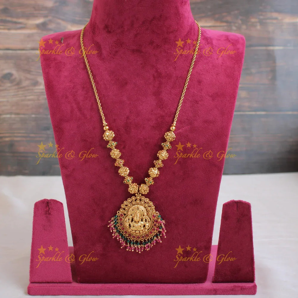 Gold alike Lakshmi carved Pendent with chain with multi color stones and pink green beads - Sparkle and Glow