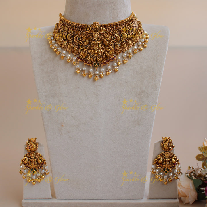Grand intricate Lakshmi peacock carved kemp stone choker with pearls gold beads