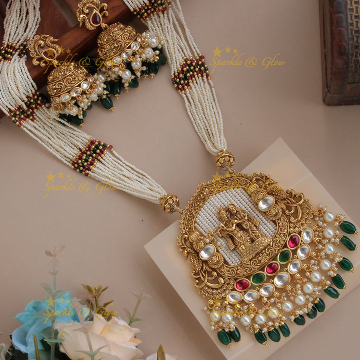 Statement Radha Krishna  jadau pendent haram with multi layer pearl chain and green beads