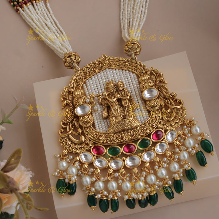 Statement Radha Krishna  jadau pendent haram with multi layer pearl chain and green beads