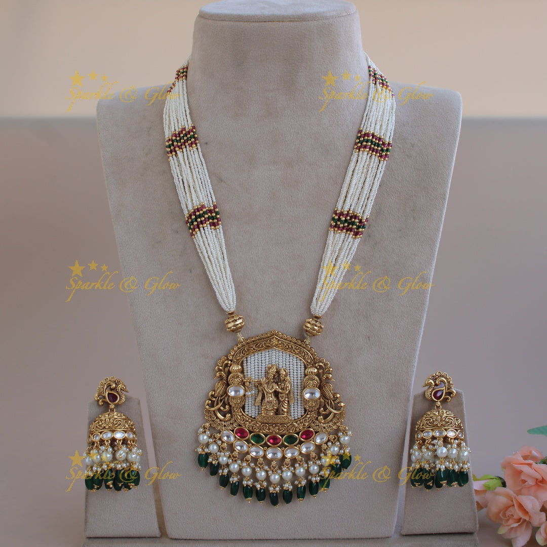 Statement Radha Krishna  jadau pendent haram with multi layer pearl chain and green beads