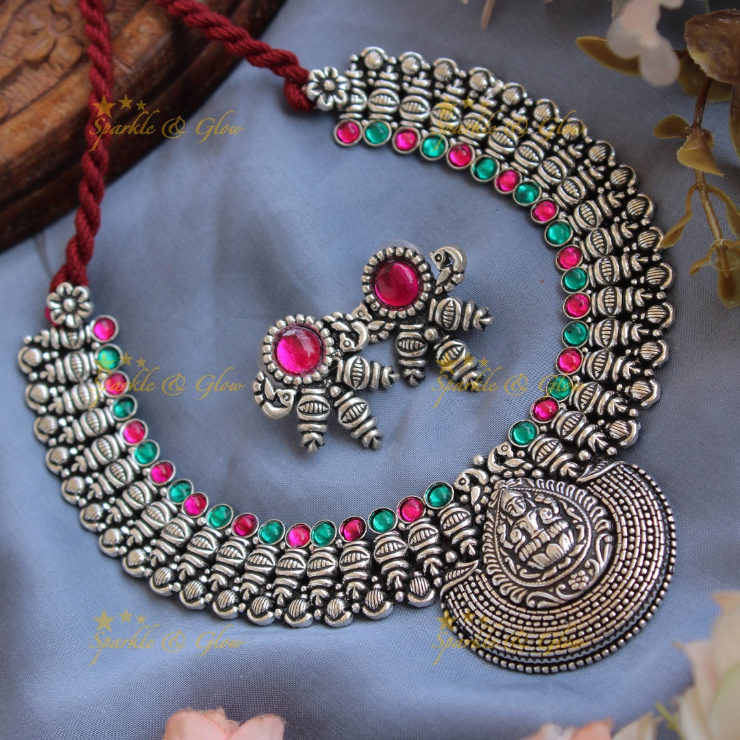 Exclusive Kohlapuri oxidised Lakshmi peacock carved unique design silver short necklace - Sparkle and Glow