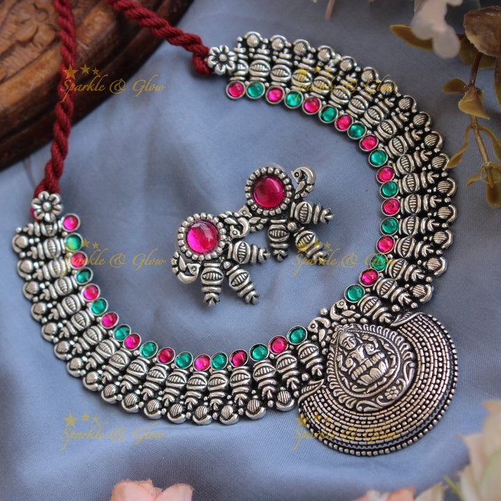 Exclusive Kohlapuri oxidised Lakshmi peacock carved unique design silver short necklace - Sparkle and Glow