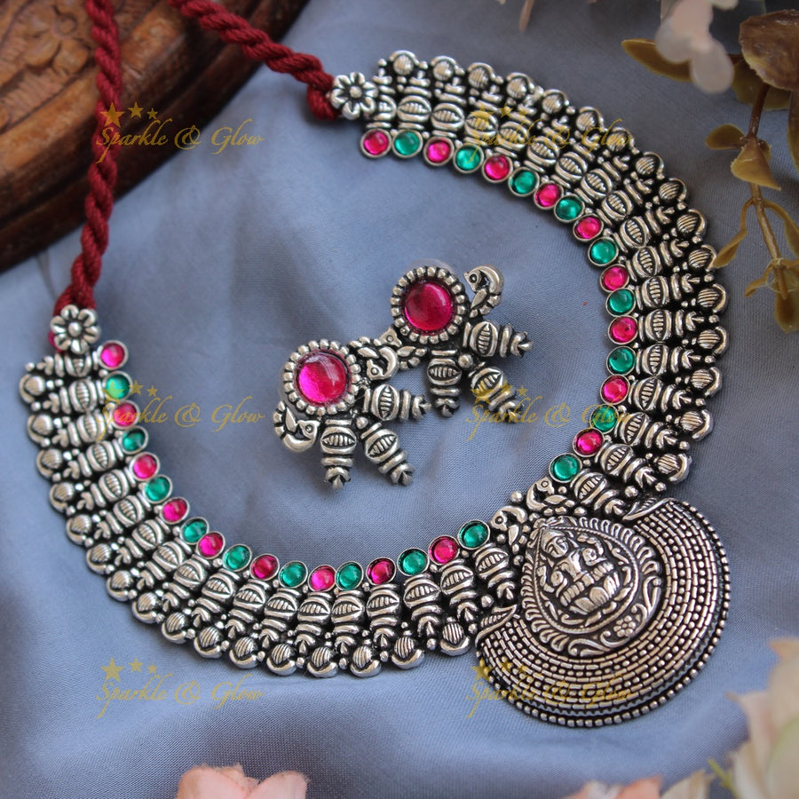 Exclusive Kohlapuri oxidised Lakshmi peacock carved unique design silver short necklace - Sparkle and Glow