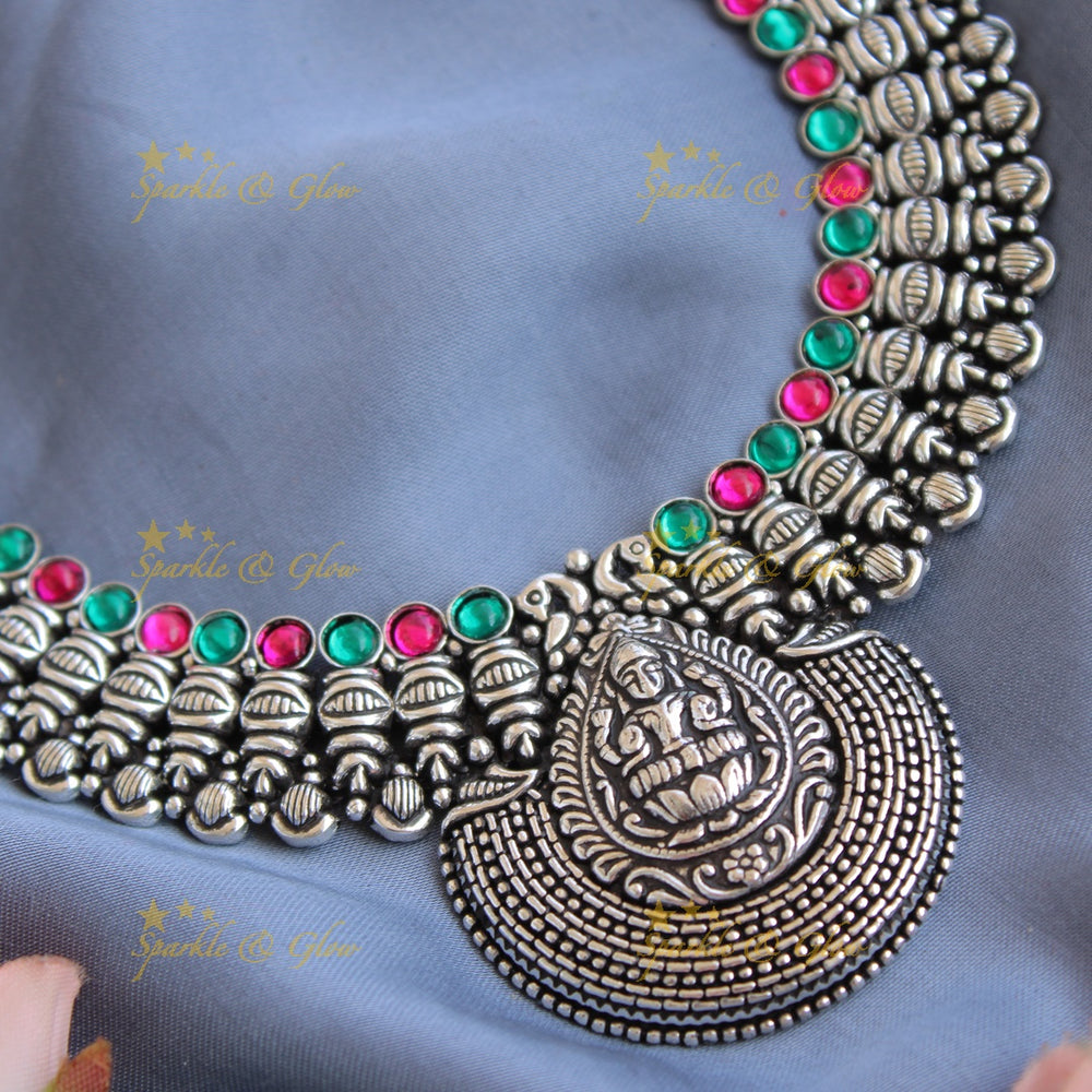 Exclusive Kohlapuri oxidised Lakshmi peacock carved unique design silver short necklace - Sparkle and Glow