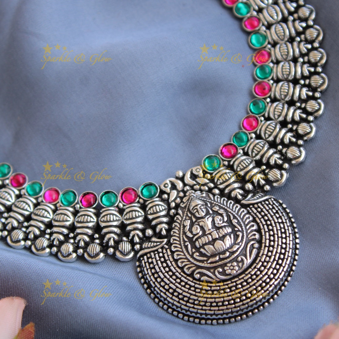 Exclusive Kohlapuri oxidised Lakshmi peacock carved unique design silver short necklace - Sparkle and Glow