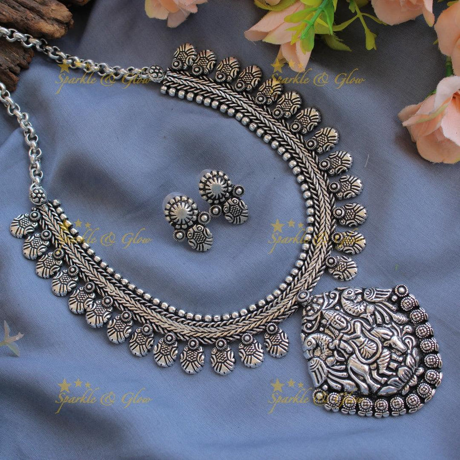 Beautiful Kohlapuri oxidised Krishna playing flute carved pendant floral silver short necklace - Sparkle and Glow