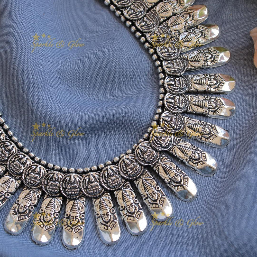 Grand intricate Kohlapuri oxidised Lakshmi coin and spike design silver short necklace - Sparkle and Glow