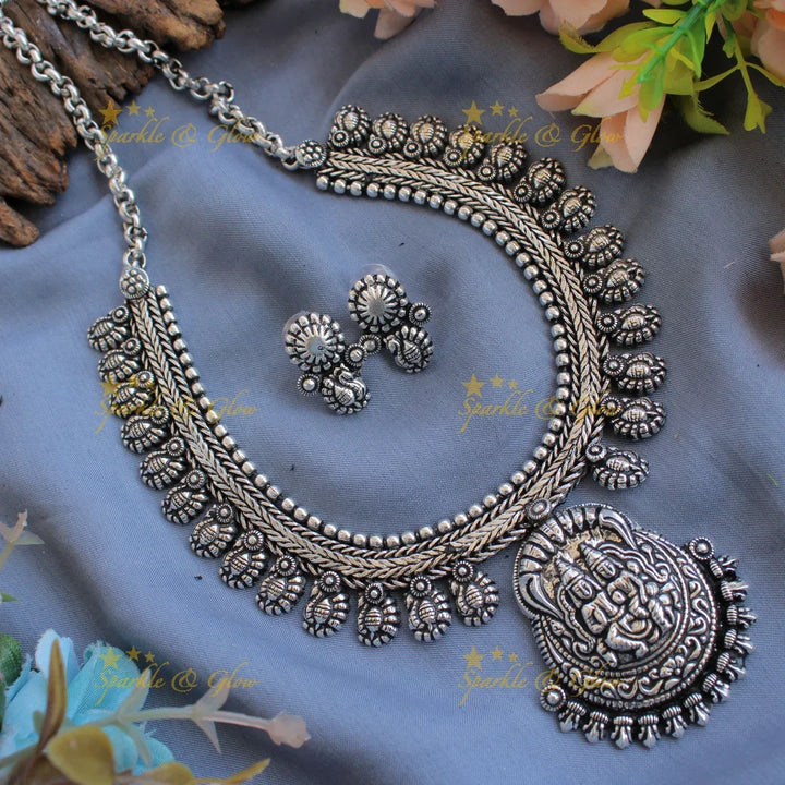 Statement Kohlapuri oxidised Lakshmi Narayana and peacock carved silver short necklace - Sparkle and Glow