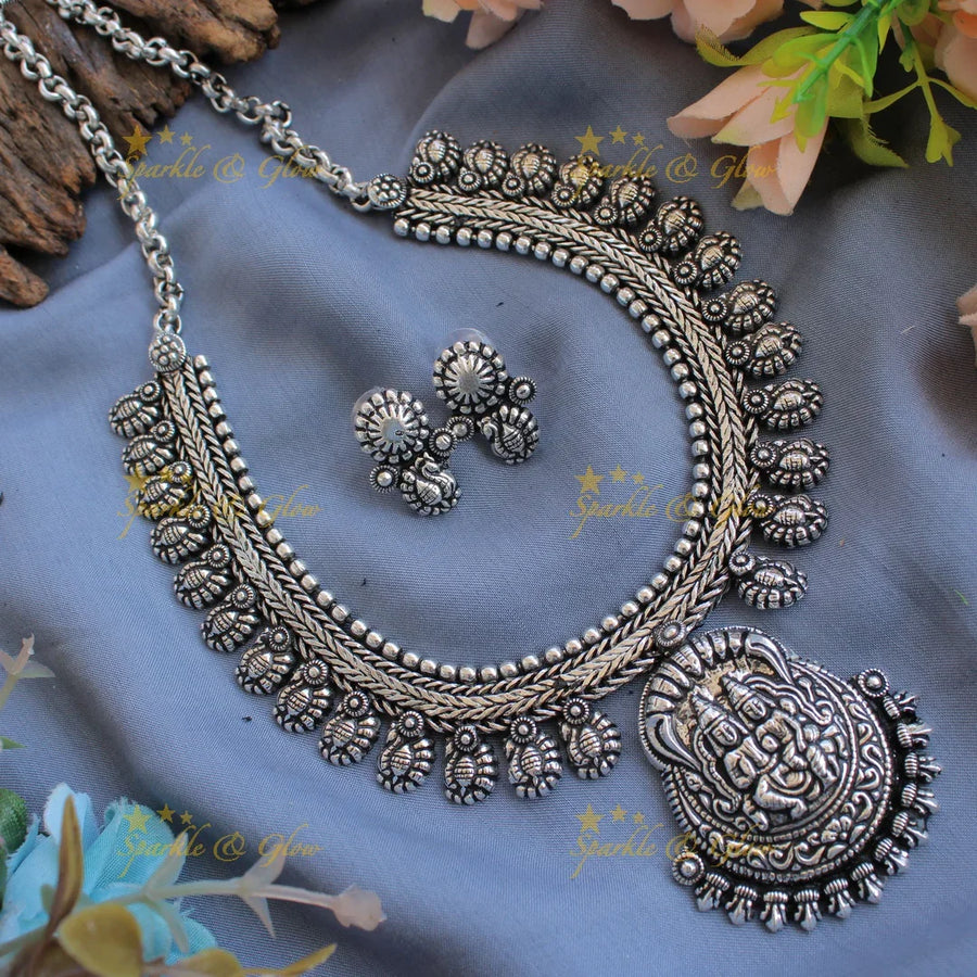 Statement Kohlapuri oxidised Lakshmi Narayana and peacock carved silver short necklace - Sparkle and Glow