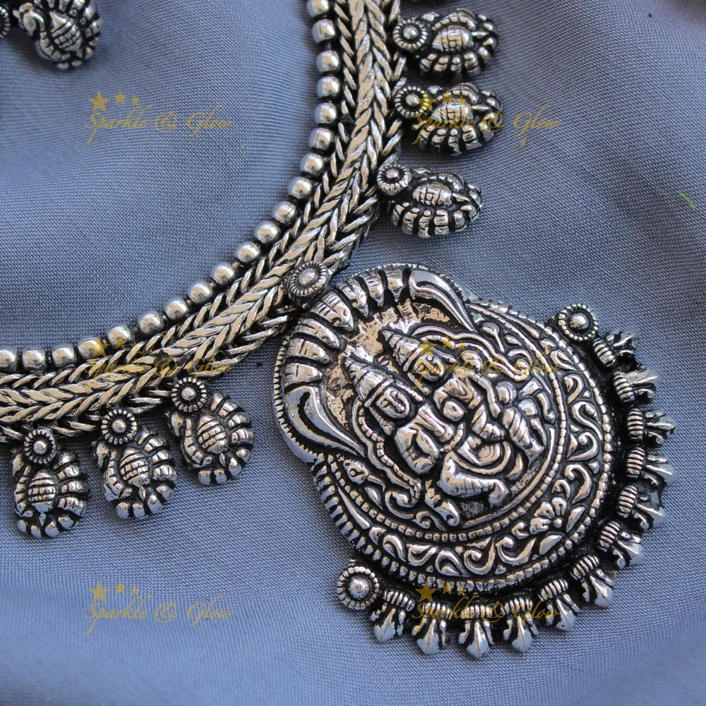 Statement Kohlapuri oxidised Lakshmi Narayana and peacock carved silver short necklace - Sparkle and Glow