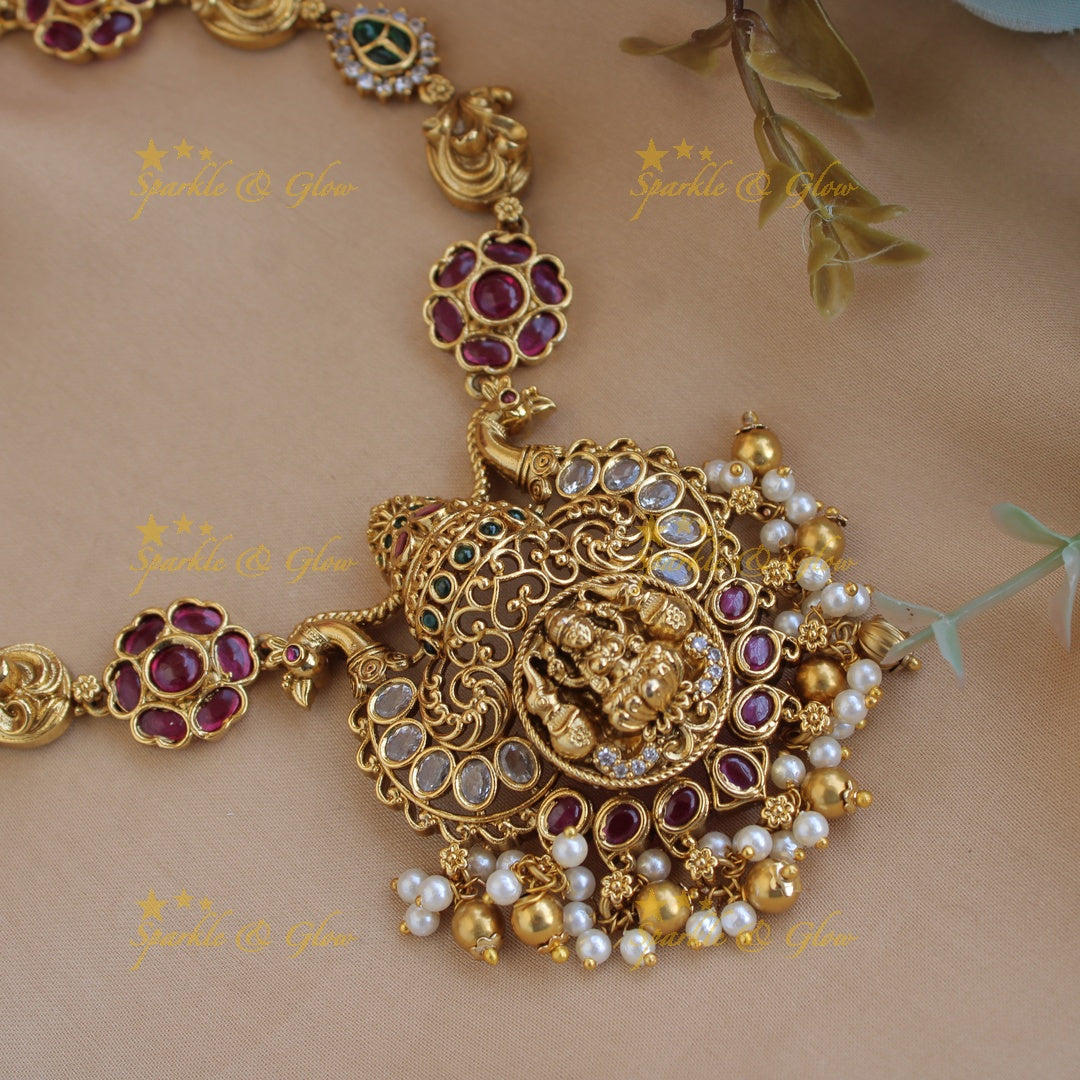 Elegant Lakshmi peacock carved floral short necklace with ruby emerald and pearls and gold beads