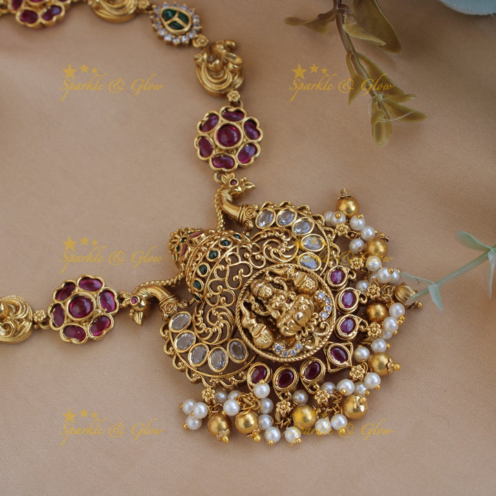 Elegant Lakshmi peacock carved floral short necklace with ruby emerald and pearls and gold beads