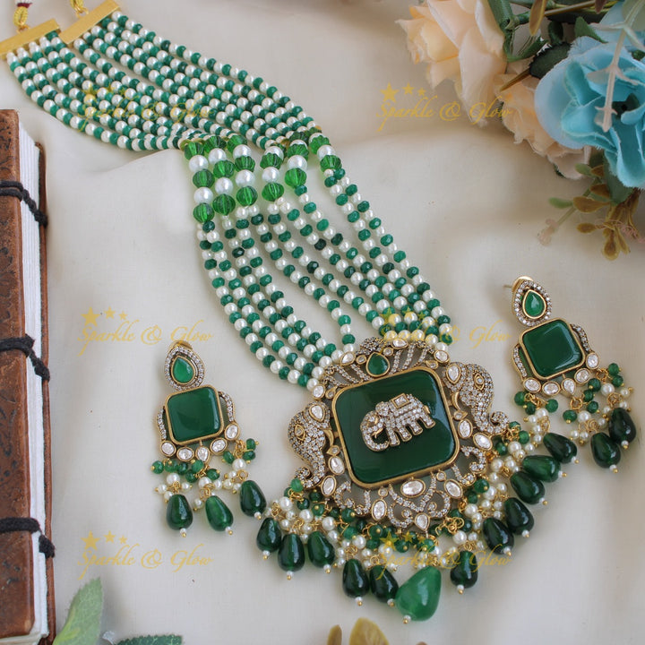 Gorgeous Elephant carved Victorian AD haram with emerald with multi layer pearl and green beads chain