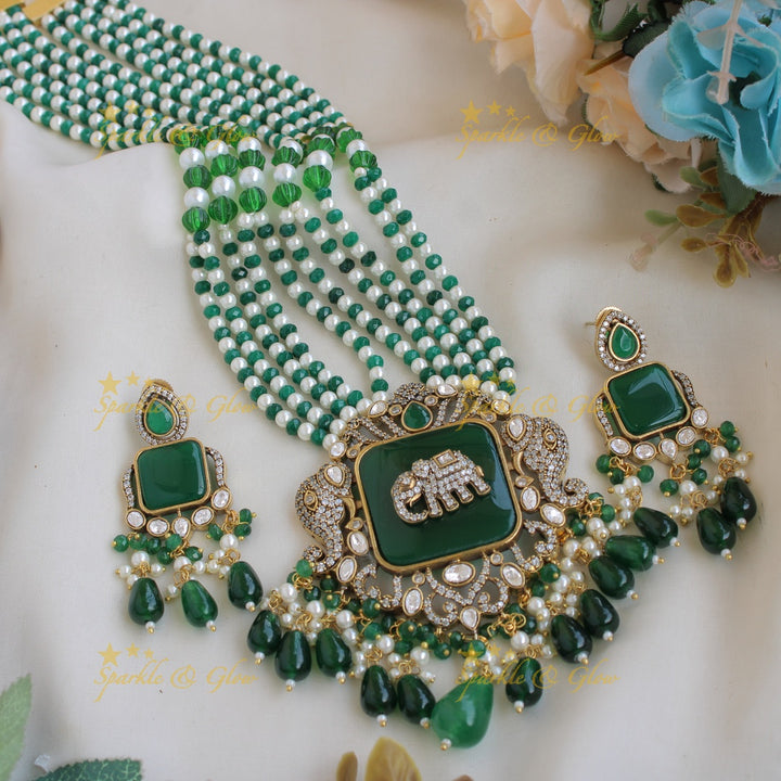 Gorgeous Elephant carved Victorian AD haram with emerald with multi layer pearl and green beads chain