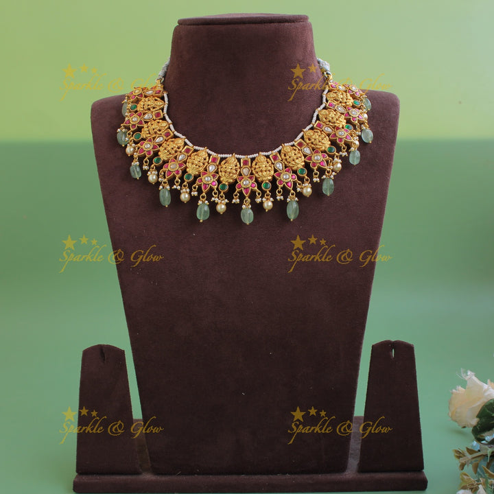 Beautiful Lakshmi carved jadau short necklace with pearls and mint green beads