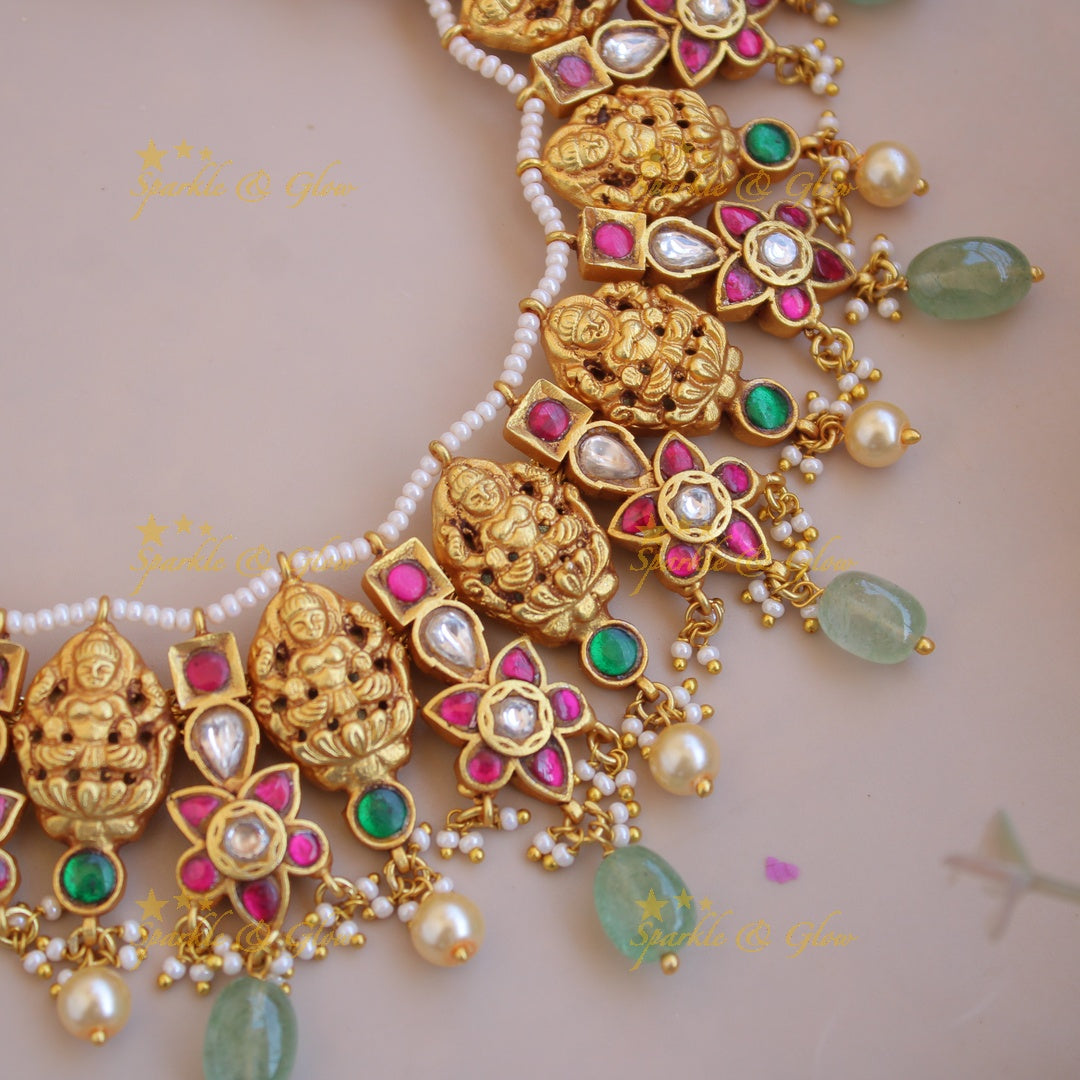 Beautiful Lakshmi carved jadau short necklace with pearls and mint green beads