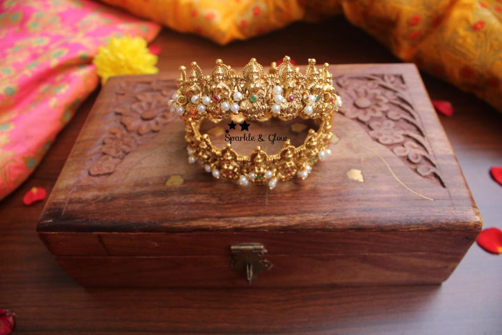 Gold alike antique polished lakshmi bangles with pearl beads a pair
