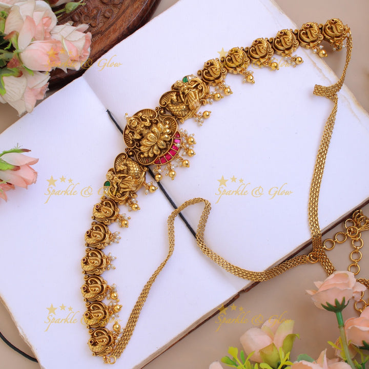 Elegant Lakshmi peacock carved jadau hipchain with pearls and mint green beads