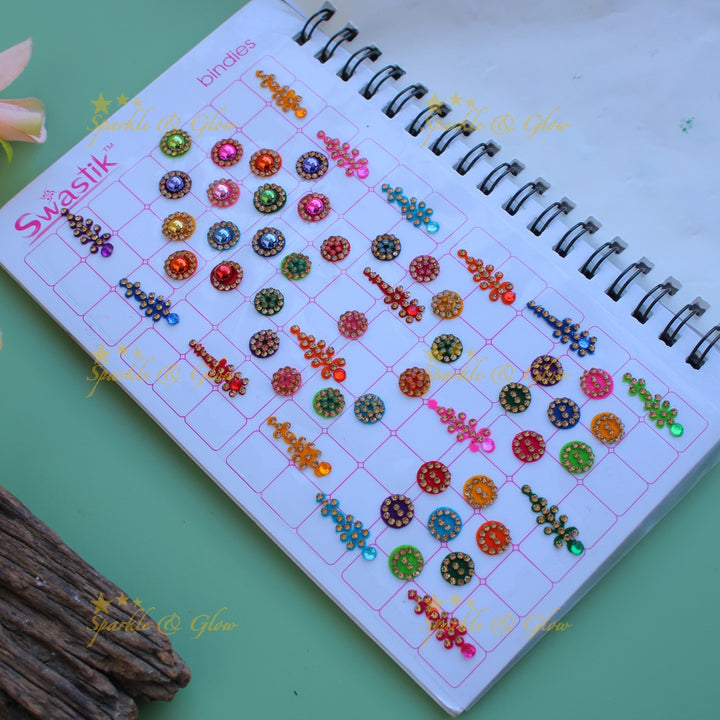 Swastik bridal stone bindi with different shape and size in spiral book in assorted colours