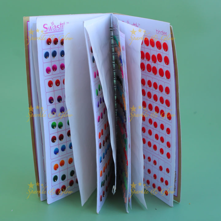 Swastik round shape single stone bindi with different size in spiral book in assorted colours