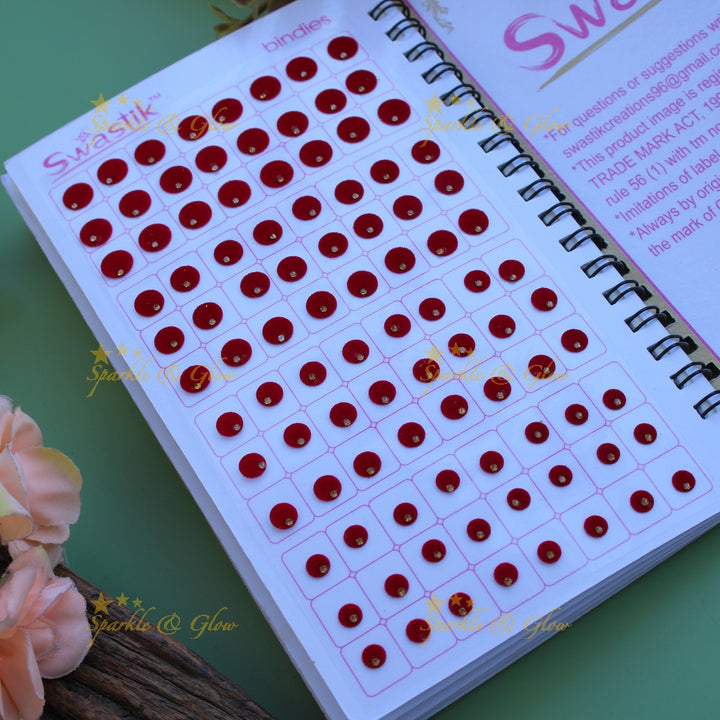 Swastik round shape single stone bindi with different size in spiral book in assorted colours