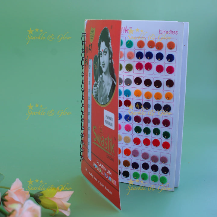 Swastik round shape single stone bindi with different size in spiral book in assorted colours