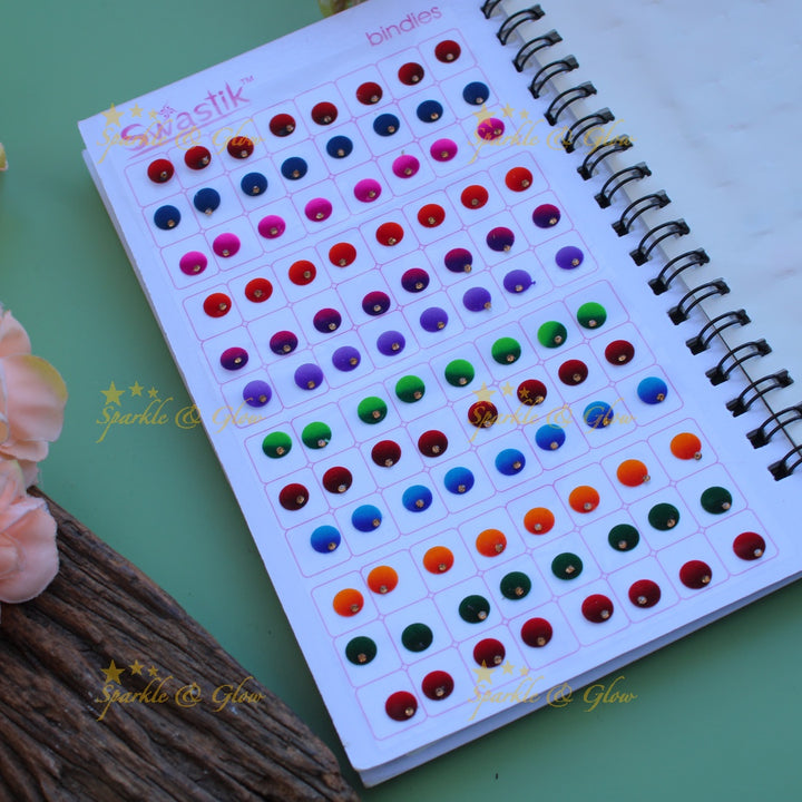Swastik round shape single stone bindi with different size in spiral book in assorted colours