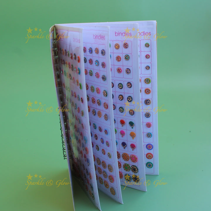 Swastik stone bindi with different shape and size in spiral book in assorted colours
