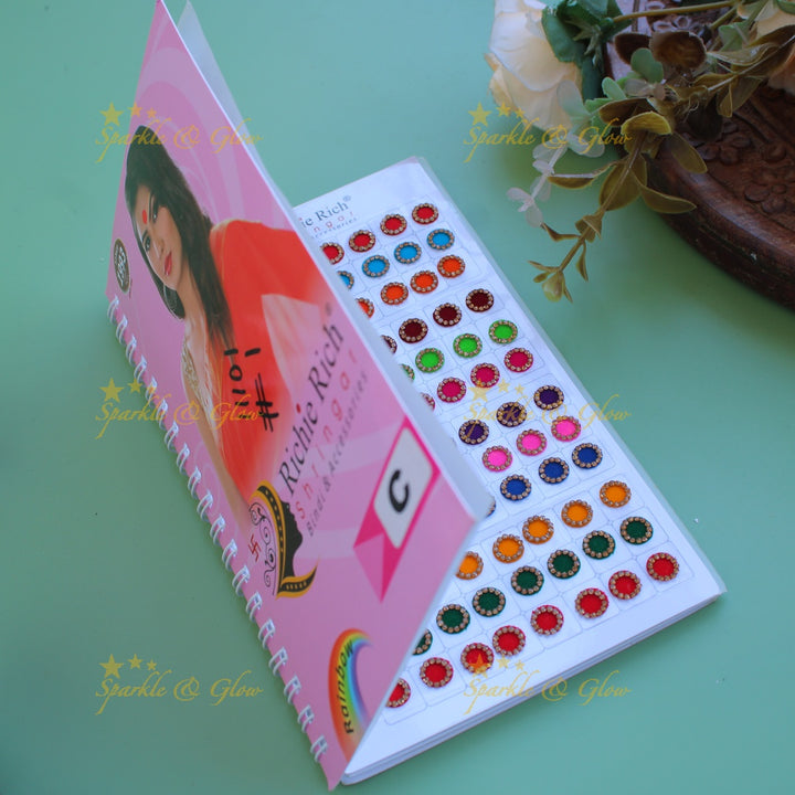 Richie Rich round stone and print bindi with different size in spiral book in assorted colours