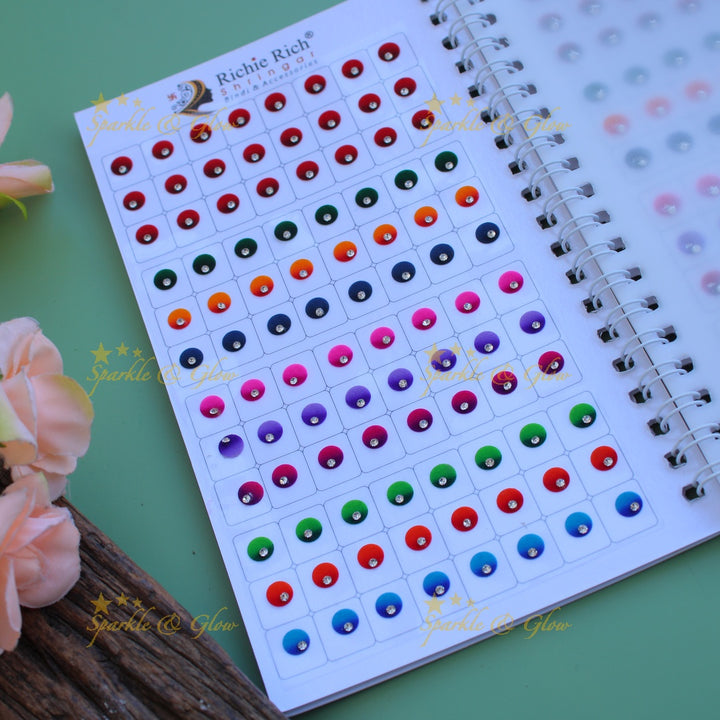 Richie Rich round single stone dual shade bindi with different size in spiral book in assorted colours