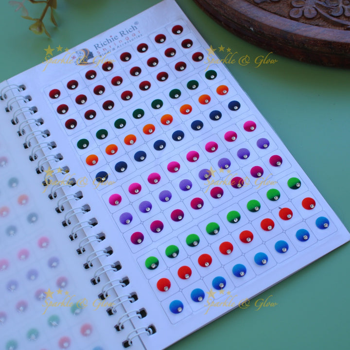 Richie Rich round single stone dual shade bindi with different size in spiral book in assorted colours