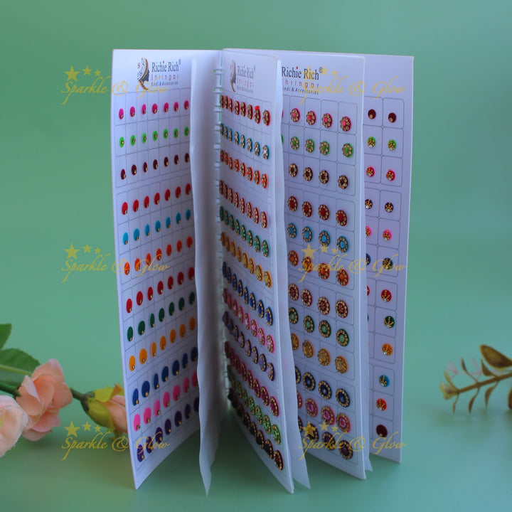 Richie Rich round single stone and different design bindi with different size in spiral book in assorted colours