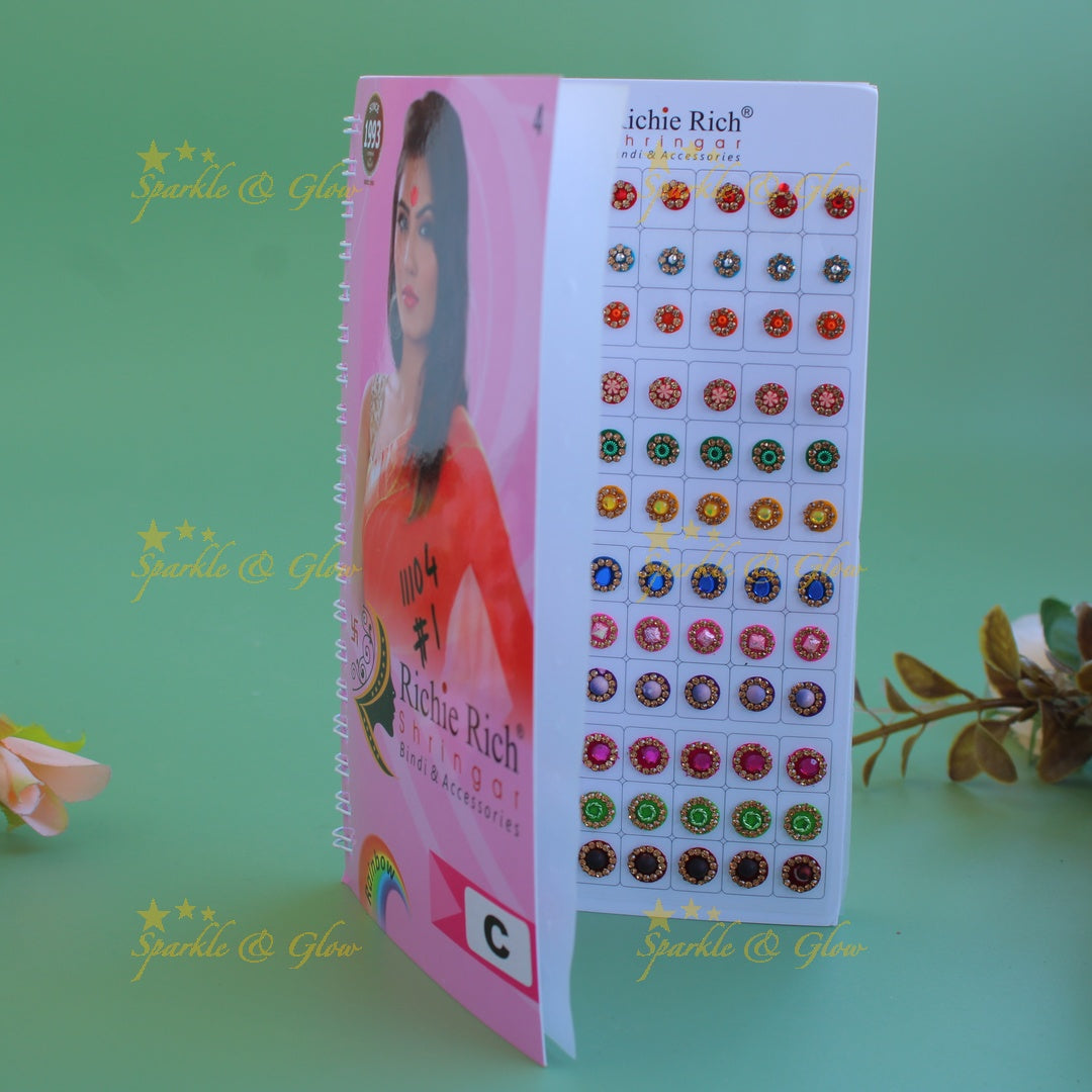 Richie Rich round single stone and different design bindi with different size in spiral book in assorted colours