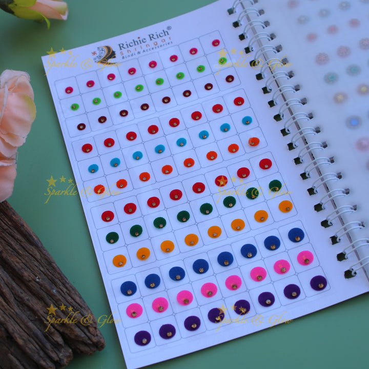 Richie Rich round single stone and different design bindi with different size in spiral book in assorted colours