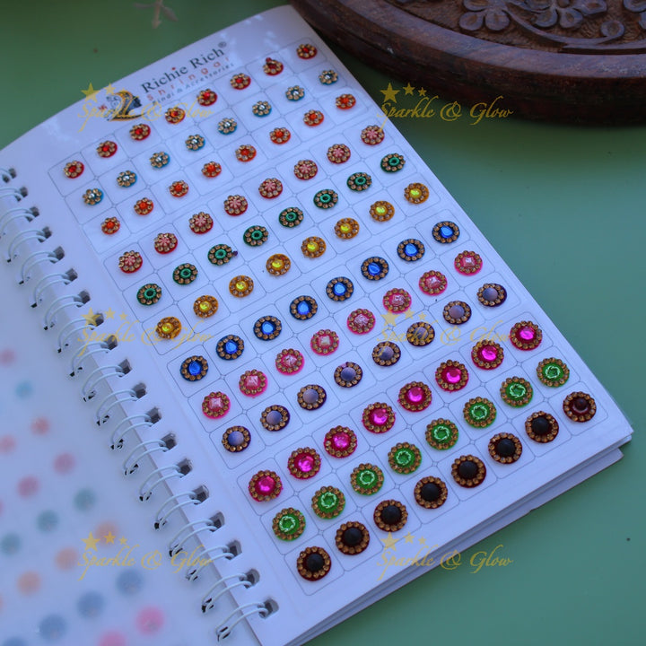 Richie Rich round single stone and different design bindi with different size in spiral book in assorted colours