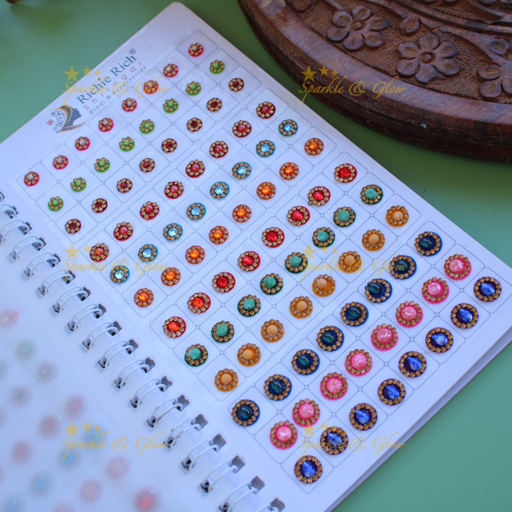 Richie Rich round stone gold bead and 3D design bindi with different size in spiral book in assorted colours