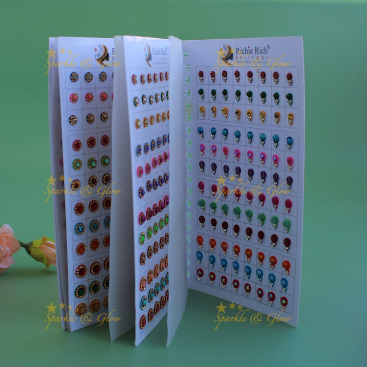Richie Rich round stone and 3D design bindi with different size in spiral book in assorted colours