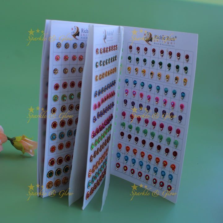 Richie Rich round stone and 3D design bindi with different size in spiral book in assorted colours
