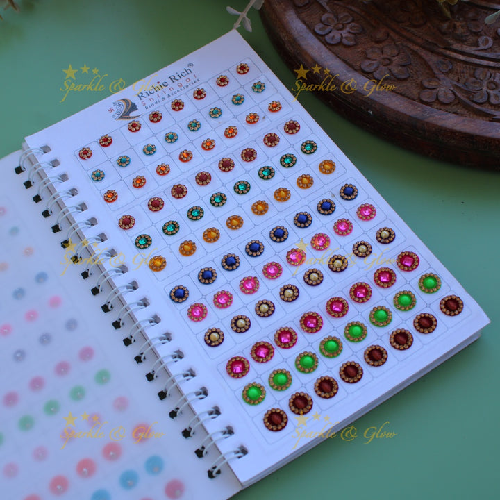 Richie Rich round stone and 3D design bindi with different size in spiral book in assorted colours