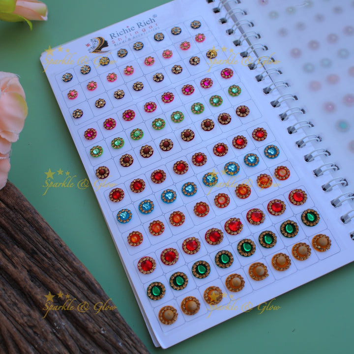 Richie Rich round stone and 3D design bindi with different size in spiral book in assorted colours