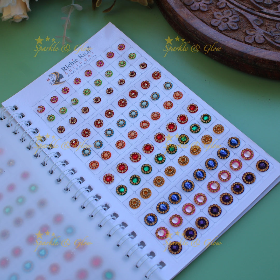 Richie Rich round stone and 3D design bindi with different size in spiral book in assorted colours