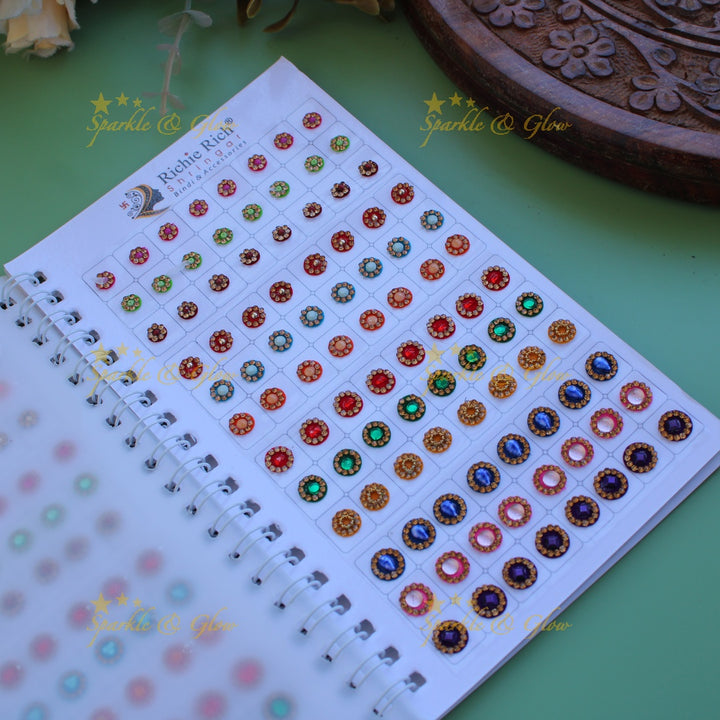 Richie Rich round stone and 3D design bindi with different size in spiral book in assorted colours