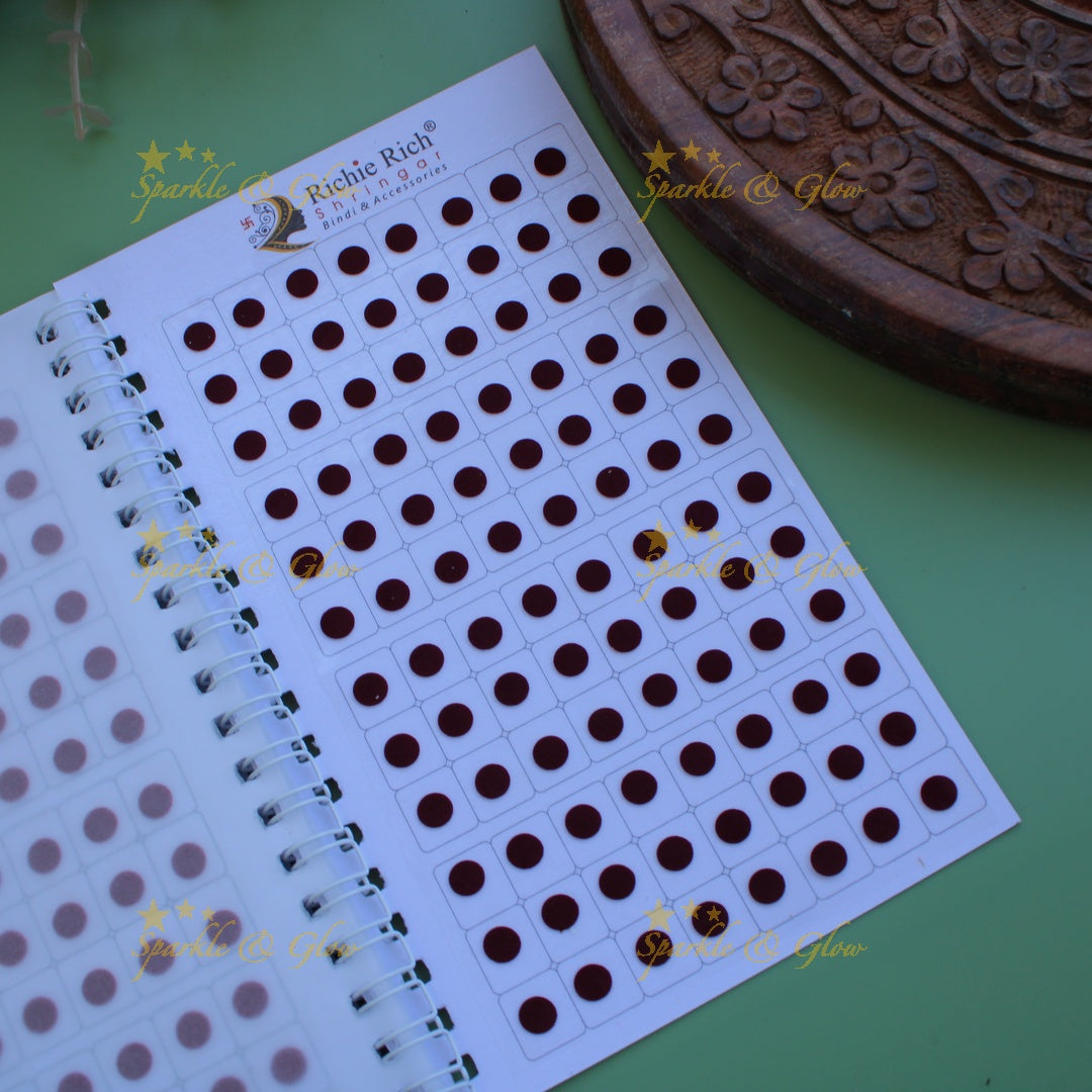 Richie Rich daily wear round plain bindi in spiral book in assorted colours