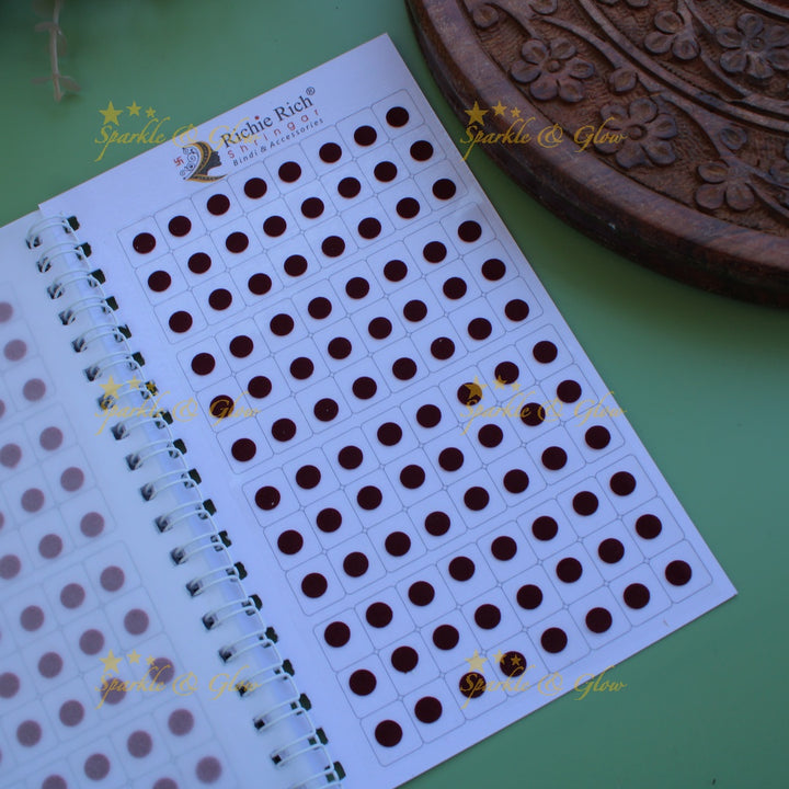 Richie Rich daily wear round plain bindi in spiral book in assorted colours