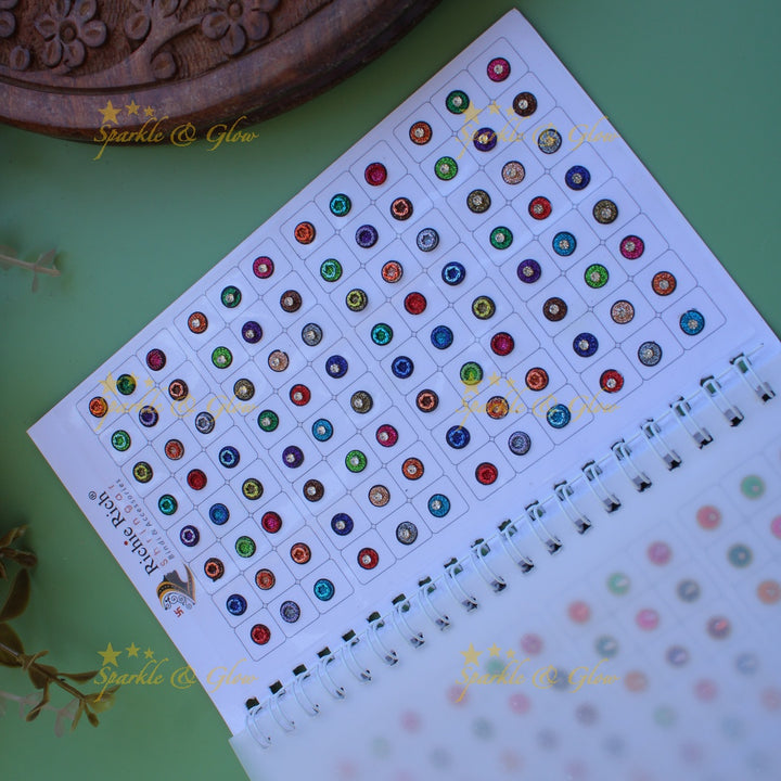 Richie Rich round single stone and 3D design bindi with different size in spiral book in assorted colours